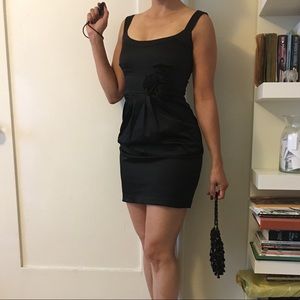 Adorable black satin dress w rosettes and pockets!